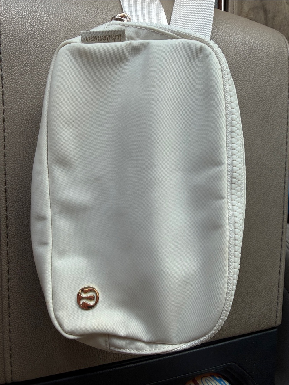 lululemon athletica Cream Mini Sling Bag with Gold Logo
